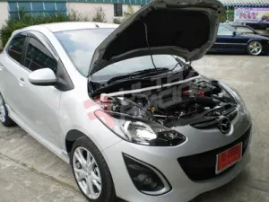 Ultra Racing Mazda 2 07+ UltraRacing 2-Point Front Upper Strutbar (RHD), référence TW2-693