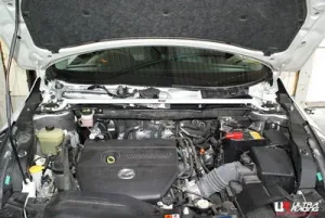 Ultra Racing Mazda 8 LY 06+ 2.3 UltraRacing Front Upper Strutbar 1395, référence TW2-1395
