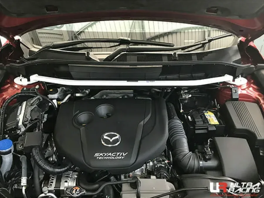 Ultra Racing Mazda CX-5 (KF) 2.0/2.2D 17+/CX-8 2.2D/2.5 17+ 2WD/4WD UltraRacing 2-Point Front Upper Strutbar (3953), référence TW2-3953